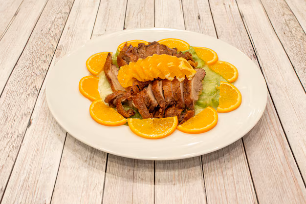 Pato con naranja