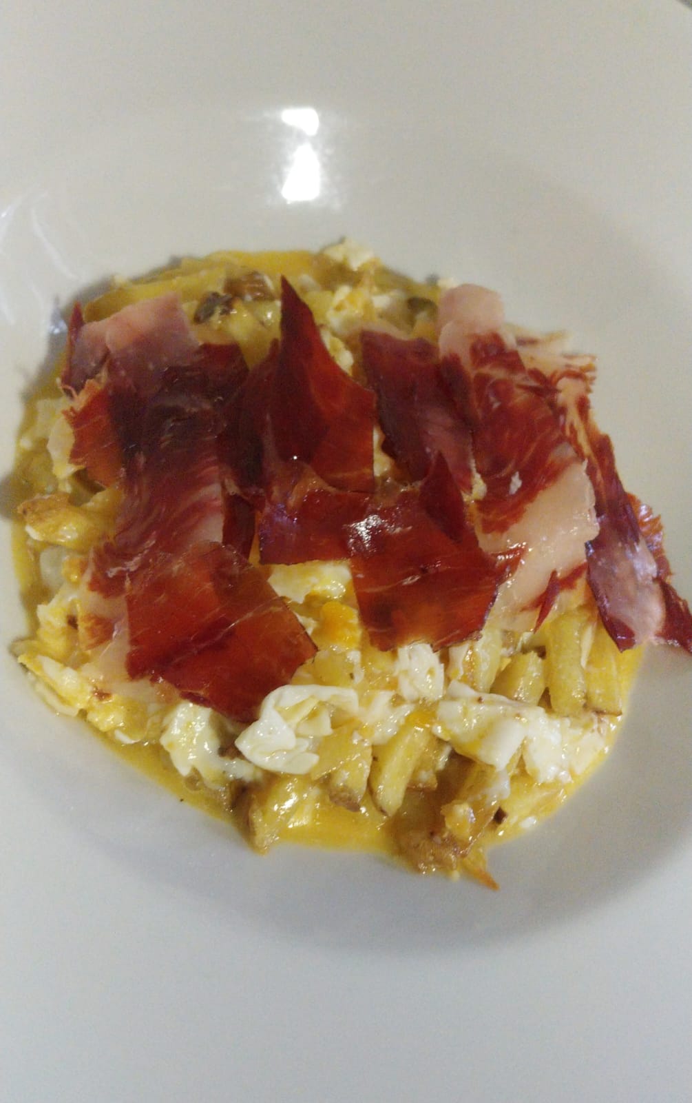 Huevos a la trilla al jamón ibérico