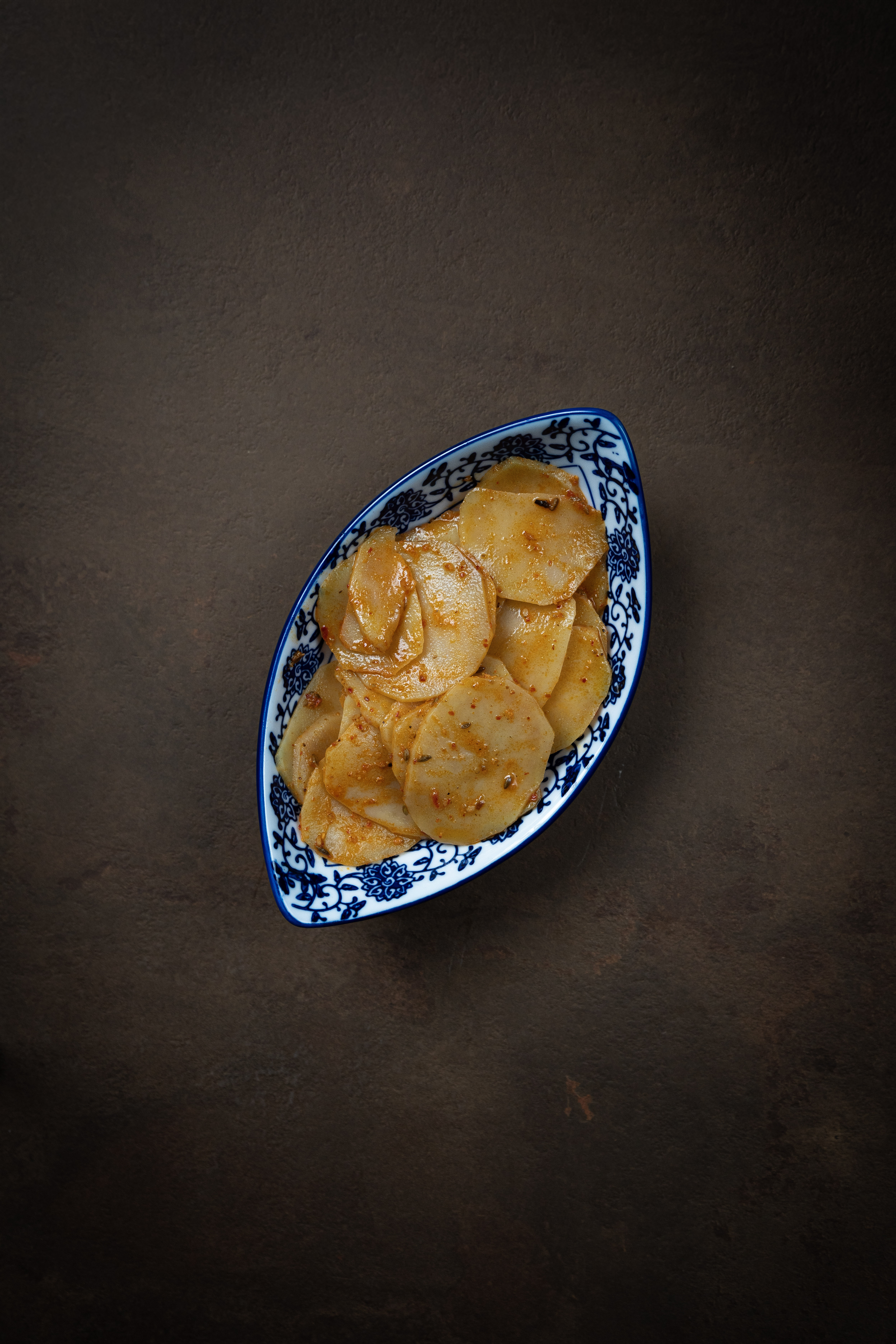 Patate aromatizzate al cumino