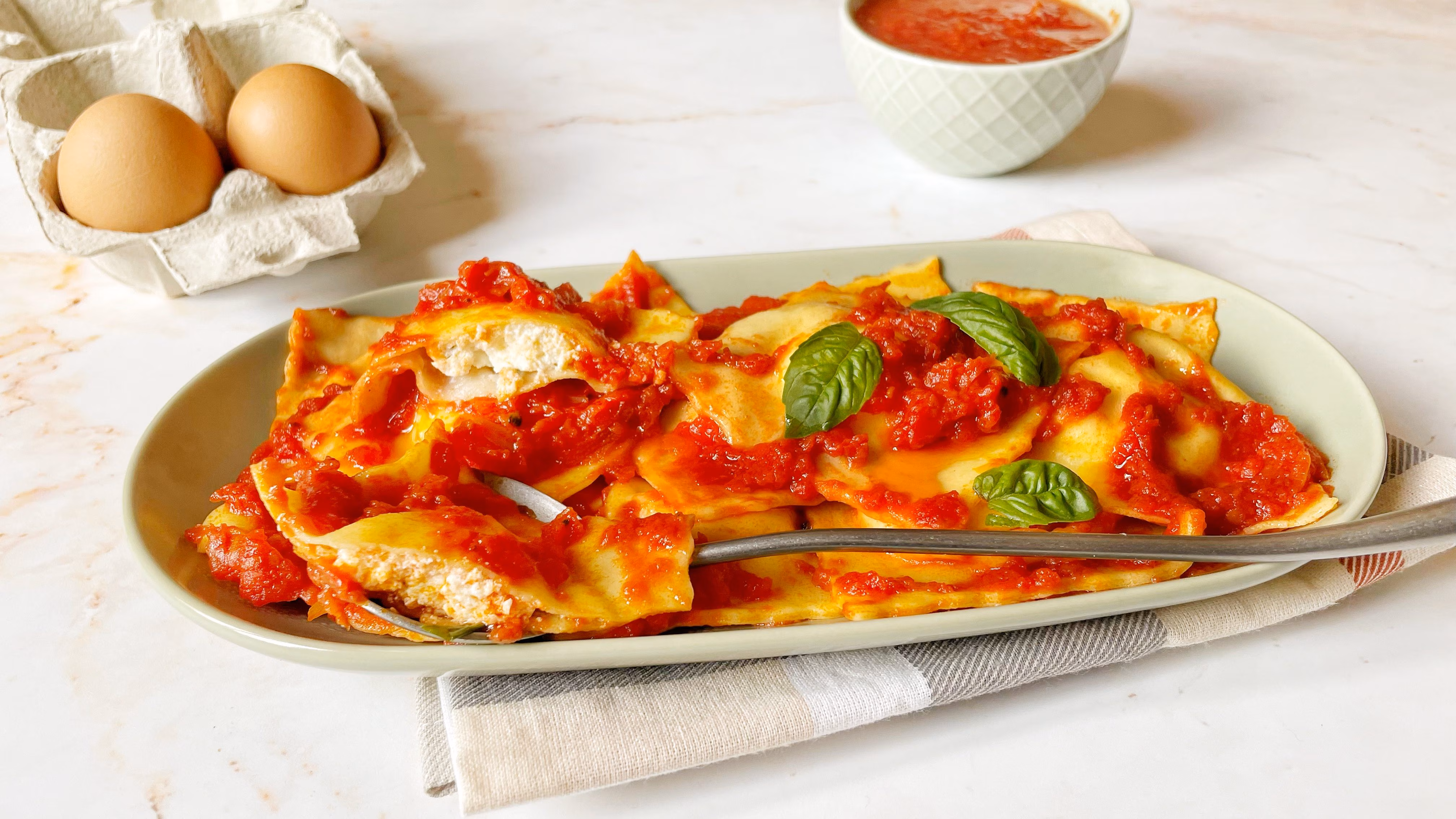 Ravioli alla cernia con cremina di Pachino