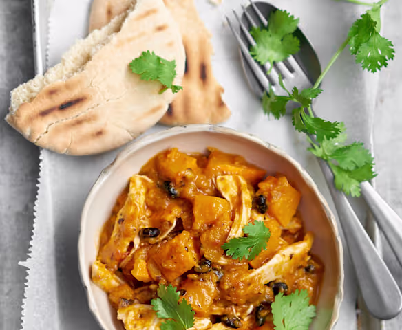 Curry di verdure con pane arabo