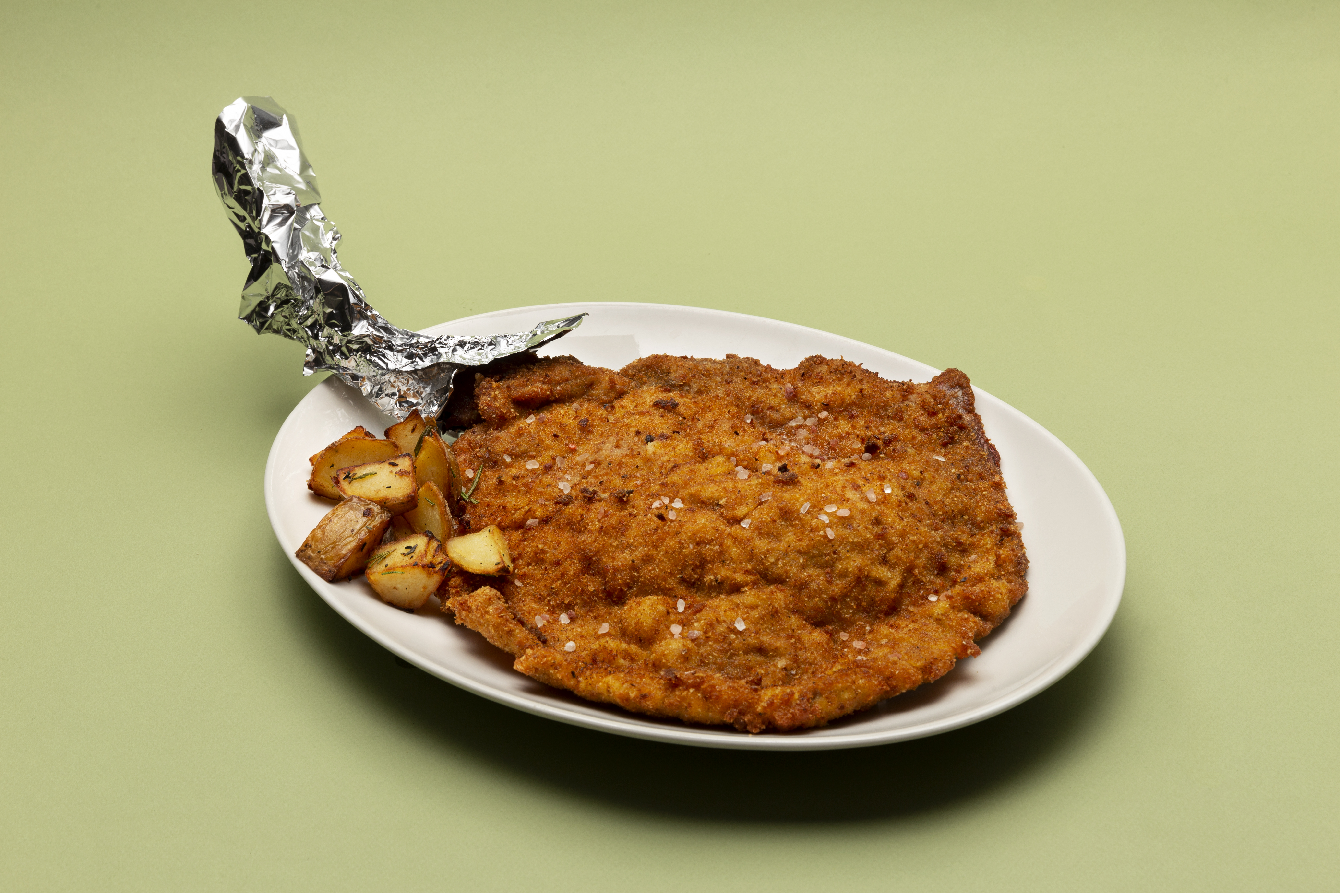 Costoletta alla milanese con osso + patate al forno