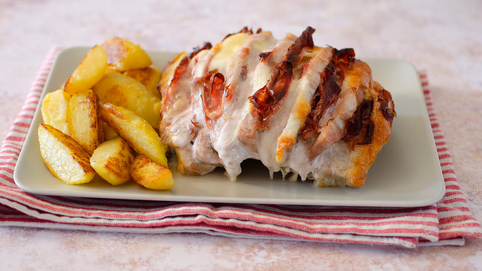 Arista di maiale gratinata al forno, con provola e speck 150 g